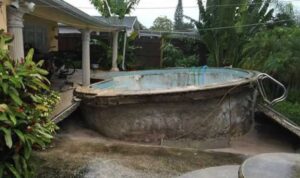 Fiberglass-Pool-Popped-Out-of-Ground.